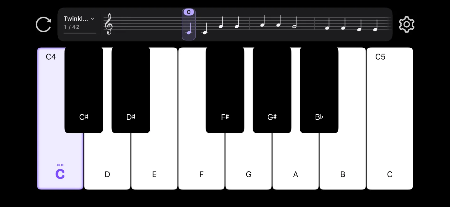 PianoSprout on iPhone: a staff above the keyboard, and the key to play glowing purple